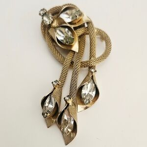 Vintage brooch with rhinestone navette stones and gold mesh chains
